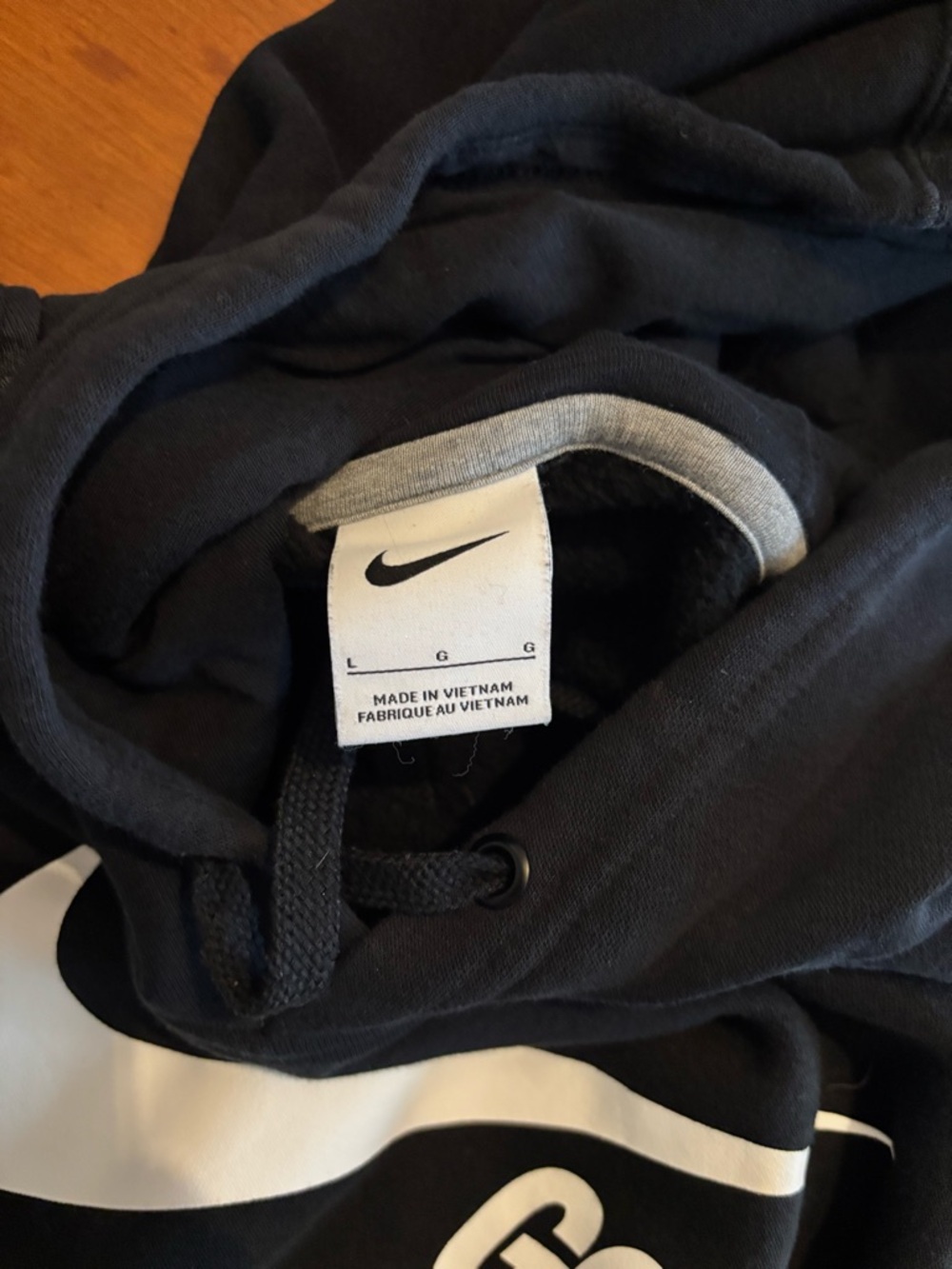 Nike Black Hoodie with White Swoosh and Trim